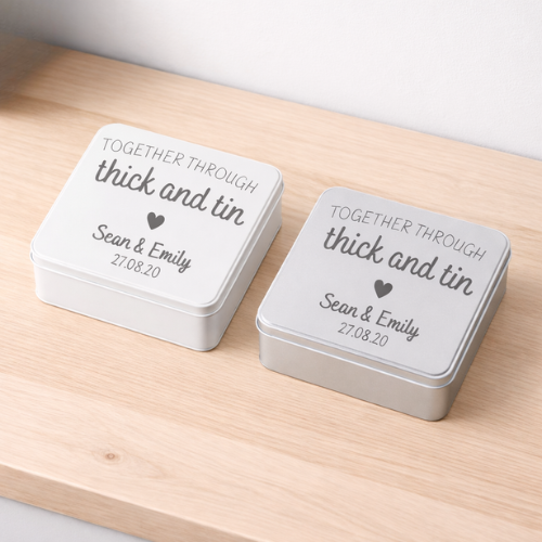 two tins for 5th anniversary with names on the tin