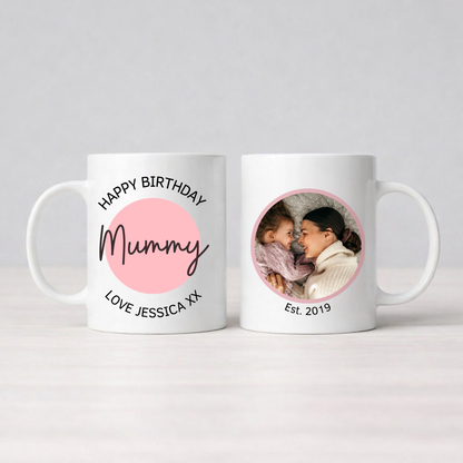 Two personalised mugs with one displaying 'Happy Birthday Mummy' and the other with a photo of two people.